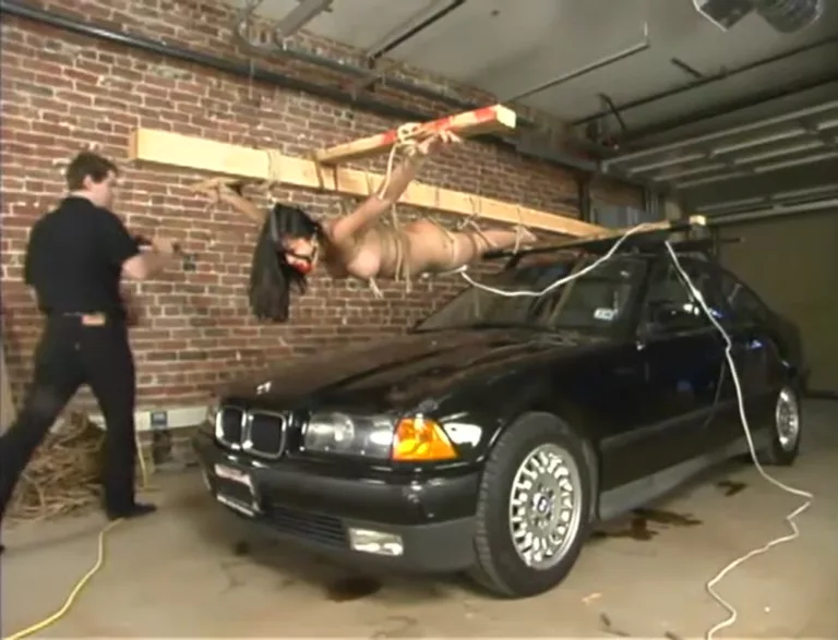 Crucified on a Car (Hogtied)