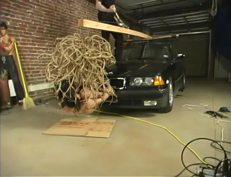 Crucified on a Car (Hogtied)